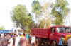 Angry villagers block sand trucks at Eliyarapadavu